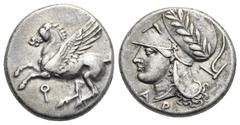 Greek CORINTHIA. Corinth. Circa 345-307 BC. Stater (Silver, 22.00 mm, 8.48 g). Pegasus flying to left, below, koppa. Rev. Head of Athena left, wearing laureate Corinthian helmet and pearl necklace; be