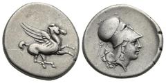Greek AKARNANIA. Leukas, circa 350-320 BC. Stater (Silver, 23 mm, 8.48 g) Pegasus flying right. Rev. Head of Athena right wearing Corinthian helmet, caduceus and Λ behind her neck. Calciati 95 var. (Λ