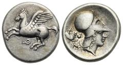 Greek CORINTHIA. Corinth. Circa 350-300 BC. Stater (Silver, 21.30 mm, 8.44 g). Pegasus flying to left, below, Ϙ. Rev. Helmeted head of Athena right, wearing Corinthian helmet; behind head, forepart of
