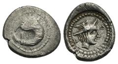 Greek LYCIA. Patara. Circa 400 BC. Hemidrachm. (Silver, 15.61 mm, 2.42 g) Dolphin; within pelleted circular border. Rev. Head of Hermes right, wearing winged petasos; in the fields, Γ – Τ; all within 