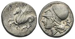 Greek CORINTHIA. Corinth. Circa 345-307 BC. Stater (Silver, 19.50 mm, 8.64 g). Pegasos flying to left, below, Ϙ. Rev. Head of Athena to left, wearing Corinthian helmet; below chin, Δ; behind neck guar