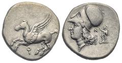 Greek CORINTHIA. Corinth. Circa 345-307 BC. Stater (Silver, 21.00 mm, 8.51 g). Pegasos flying to left; below, Ϙ. Rev. Head of Athena to left, wearing Corinthian helmet; behind neckguard, N and Ares st