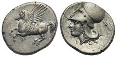 Greek CORINTHIA. Corinth. Circa 345-307 BC. Stater (Silver, 21.00 mm, 8.52 g). Pegasos flying to left; below, Ϙ. Rev. Head of Athena to left, wearing Corinthian helmet; below chin, I; behind neck guar