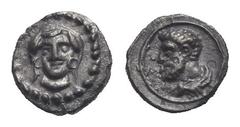 Greek CILICIA. Uncertain mint. Circa 4th century BC. Tetartemorion (Silver, 6.18 mm, 0.15 g). Female head facing, wearing circular earrings. Rev. Bare and bearded bust of Herakles left, wearing lion s