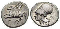 Ancient Greek World Corinthia. Corinth. Circa 375-300 BC. Stater (Silver, 22.00 mm, 8.58 g). Pegasus landing left; koppa below. Rev. Helmeted head of Athena left; behind, bow and quiver; before, I. Ca