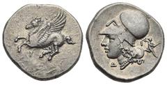 Ancient Greek World Corinthia. Corinth. Circa 375-300 BC. Stater (Silver, 21.44 mm, 8.58 g). Pegasus landing left; koppa below. Rev. Helmeted head of Athena left; behind, I and Artemis running right, 
