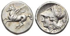Ancient Greek World Corinthia. Corinth. Circa 375-300 BC. Stater (Silver, 21.52 mm, 8.44 g). Pegasus landing left; koppa below. Rev. Helmeted head of Athena left, helmet decorated with laurel branch; 