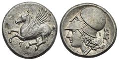 Ancient Greek World Corinthia. Corinth. Circa 375-300 BC. Stater (Silver, 20.63 mm, 8.59 g). Pegasus landing left; koppa below. Rev. Helmeted head of Athena left, helmet decorated with laurel branch; 