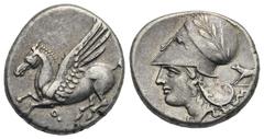 Ancient Greek World Corinthia. Corinth. Circa 375-300 BC. Stater (Silver, 20.82 mm, 8.52 g). Pegasus landing left; koppa below. Rev. Helmeted head of Athena left, helmet decorated with laurel branch; 