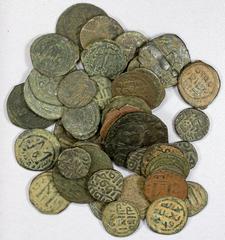 Group Lots - Islamic MEDIEVAL ISLAMIC: LOT of 47 copper coins, including Umayyad, Arab-Byzantine, Abbasid, Mamluk, Ghaznavid, Artuqid, Zangid, and Delhi Sultanate; mostly decent pieces, average F-VF, 