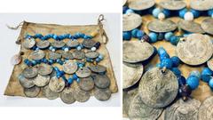 Ethnographic Money TURKEY: coin cloth, 175mm, cloth sewn with 24 coins, trade beads and a single shell, pierced coins are all from Sultan Mahmud II, 1½ kurush billon coins from the Tenth series struck