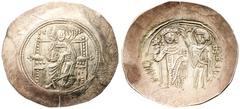 Ancient Coins Manuel I Comnenus. Electrum Aspron Trachy (4.12 g), 1143-1180 Constantinople, 1167-circa 1183. IC - XC, Christ Pantokrator enthroned facing, raising hand in benediction and holding Gospe