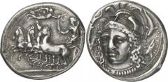 The Prospero Collection of Ancient Greek Coins. SICILY. Syracuse , Dionysios I (c.405-367 B.C.), Silver Tetradrachm, 17.11g,. Signed by Eukleidas, struck c.405-400 B.C. Female charioteer, wearing a lo