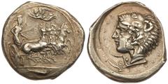 Sicily, Kamarina. Silver Tetradrachm (16.96 g), ca. 425-405 BC. Athena driving galloping quadriga right; above, Nike flying left, crowning Athena with wreath; in exergue, fish right.rev. KAMAPI-NAION,