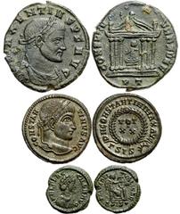 Lot 134.  Lot of Three Late Roman Æ's. Includes the following: Maxentius. Ticinum mint. Roma seated left in hexastyle temple. RIC VI 95 // Constantine I. Siscia mint. VOT XX in wreath. RIC VII 180 // 