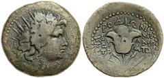 Lot 25.  ISLANDS off CARIA. Rhodos. Rhodes. Circa 31 BC-60 AD. Æ 33mm (22.55 g). Teimostratos, magistrate. Radiate head of young Dionysos right, wearing ivy wreath / Rose with two buds between poppy a