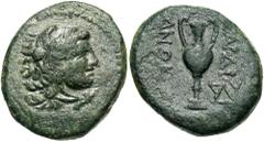 Lydia, Sardes. Ca. 133 B.C.-A.D. 14 Æ (14 mm, 3.45 g, 1 h). Head of youthful Herakles right, wearing lion's skin headdress / ΣAPΔI-ANΩN, kantharos; in lower right field, monogram. Cf. Johnston 228-30;