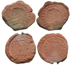Diocletian and Galerius, as Caesar. A.D. 284-305 and 293-305, respectively. A pair of clay coin molds. Two double-sided coin molds, reportedly discovered together. 3 and 29 mm respectively. One has in