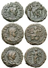 Lot 149.  Lot of Three Alexandrian Tetradrachms Featuring Carus, Carinus and Numerian. Includes the following: Carus. Year 1. Laureate and draped bust right / Eagle standing left, head turned right, b
