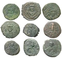 Lot 191.  Lot of Nine Byzantine Issues. Includes the following: Justinian I. Antioch mint. Æ Half Follis. SB 230 // Tiberius II Constantine. Nicomedia mint. Æ Follis. SB 441 // Phocas. Cyzicus mint. Æ