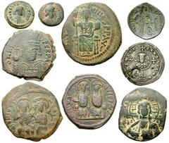 Lot 135.  Lot of Nine Byzantine Issues. Includes the following: Anastasius. Æ Pentanummium. SB 29 // Justinian. Æ Follis. Antioch mint. SB 214 // Justinian I. Æ Pentanummium. SB 274 // Justin II. Æ Fo