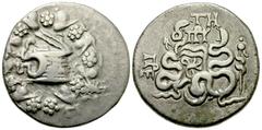 Lot 35.  MYSIA. Pergamon. Circa 76-67 BC. AR Cistophoric Tetradrachm (25mm - 11.98 g). Cista mystica with serpent; all within ivy wreath / Bow-case with serpents; TH and monogram above, thyrsus right.