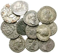 Lot 193.  Lot of Twelve Roman Silver Issues. Includes the following: Vespasian, Pax seated left // Domitian, Minerva standing left // Trajan, Victory seated left // Trajan, Trajan Pater seated left //