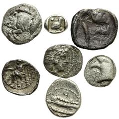 Lot 123.  Lot of Seven Greek Silver Fractional Issues. Includes the following: Tarentum. Diobol // Alexander III. Obol (2 examples) // Kyzikos. Hemiobol // Kyme. Hemiobol // Miletos. Tetartemorion // 