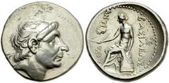 Lot 19.  SELEUKID KINGS of SYRIA. Antiochos II Theos. 261-246 BC. AR Tetradrachm (30mm - 16.74 g). Lysimachia mint. Diademed head of Antiochos I right / Apollo seated left on omphalos, holding bow in 