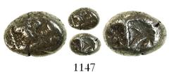Ancient Coins Lydian Kingdom, electrum hecte (1/6 stater), Alyattes, 5th to 6th century BC, Sardes mint. 2.34 grams. Confronted lion's heads (only the left is visible) / Two incuse square punches. Fin
