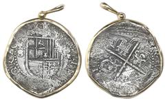 Coin Jewelry Seville, Spain, cob 8 reales, Philip II, assayer Gothic D at 4 o'clock outside tressure on reverse, from the Santiago (1585), mounted shield side out in 14K bezel with shackle bail. 29.57