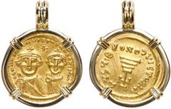 Coin Jewelry Byzantine Empire, AV solidus, Heraclius, (610-641 AD), Constantinople mint, mounted in 18K gold bezel with fixed bail.7.54 grams total.Crowned and draped facing busts of Heraclius and Con