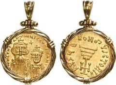 Coin Jewelry Byzantine Empire, AV solidus, Constans II (641-668 AD), mounted in 18K gold twisted-wire bezel with shackle bail.8.72 grams total.Crowned and draped facing busts of Constans and Constanti