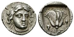 Rhodos AR Didrachm, c. 340-316 BC Rhodos, island off Caria. AR Didrachm (20 mm, 7.21 g), c. 340-316 BC. Obv. Head of Helios facing slightly right. Rev. Rose with bud right; above, ΡOΔION; to left, bun