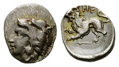 Herakleia AR Diobol, c. 430-400 BC Herakleia, Lucania. AR Diobol (11-13 mm, 1.23 g), c. 430-400 BC. Obv. Head of Herakles wearing lion's skin left. Rev. HE, lion walking left. SNG München 806. Nicely 