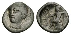 Skotussa AR Hemidrachm, c. 220 BC Skotussa, Thessaly. AR Hemidrachm (13 mm, 1.85 g), c. 220 BC. Obv. Head of Artemis facing slightly left. Rev. ΣKOTOY / ΣAIΩN, Poseidon seated left on smooth rock; hol