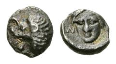 Mylasa AR Tetartemorion, c. 420-390 BC Mylasa, Caria. AR Tetartemorion (5-6 mm, 0.23 g), c. 420-390 BC. Obv. Forepart of a roaring lion right, head turned left. Rev. Three-quarter facing head of Apoll