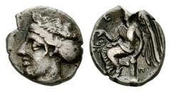 Terina AR Triobol, c. 420-400 BC Terina, Bruttium. AR Triobol (11 mm, 1.23 g), c. 420-400 BC. Obv. Head of nymph left, hair bound in sphendone. Rev. Nike seated left on cippus, holding wreath; Π to ri