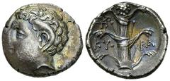 Kyrene AR Didrachm Kyrene , Kyrenaika. AR Didrachm (21 mm, 6.84 g), c. 308-277 BC. Rhodian standard. Obv. Head of Karneios to left. Rev. KY-PA, Silphium plant; to left, monogram. BMC 249. Müller 170. 