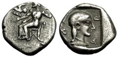 Kleitor Hemidrachm, Zeus / head of Kallisto, very rare, ex BCD Kleitor , Peloponnesos. AR Hemidrachm (14 mm, 2.79 g), c. 465-460 BC. Obv. Zeus Lykaios seated left on low throne with swan’s head at the