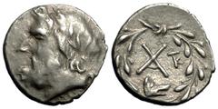 Argos Hemidrachm, ex BCD Argos , Peloponnesos. AR Hemidrachm (15 mm, 2.48 g), c. 195-188 BC. Obv. Laureate head of Zeus left. Rev. AX, to right, TK monogram, below, wolf’s head right; all within laure