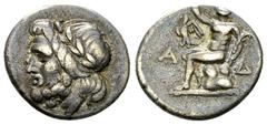 Megalopolis AR Triobol, c. 195-188 BC. Arkadian League, Megalopolis. AR Triobol (13-15 mm, 2.39 g), c. 195-188 BC. Obv. Laureate head of Zeus left. Rev. Pan seated left on rock, his right hand raised 