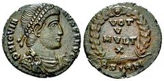 Iovianus AE Nummus, Sirmium Iovianus (363-364 AD). AE Nummus (18-19 mm, 2.73 g), Sirmium. Obv. D N IOVIANVS P F AVG, Pearl-diademed, draped and cuirassed bust to right. Rev. VOT V MVLT X in four lines
