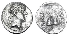 BAKTRIAN KINGDOM. Eukratides, 171-145 BC. AR Obol (0.52 gm). Diademed draped bust / Caps of the Dioskouri. SNG.ANS.458. Bop.Serie.3G. Toned VF+, slight pososity.