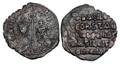 BYZANTINE EMPIRE. Basil I, 868-879 AD. Æ Follis (6.54 gm) of a provincial mint. Facing crowned busts of Basil and Constantine / Legend. S.1721. VF, brown patina.
