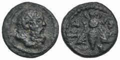 Lydia, Akrasos. Civic Isue. A.D 192-211. AE 14 (13.9 mm, 1.68 g, 12 h). Bearded bust of Herakles right / AKΡAΣIΩTΩN, bee. BMC 10; SNG von Aulock 2881 var (head of Athena). aVF.