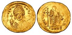 BYZANTINE EMPIRE. Justinian I, 527-565 AD. Gold Solidus (4.48 gm) of Constantinople. Crowned bust facing / Angel standing, facing. S.139. aXF, weak spot.