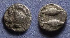 Mysia, Kyzikus 460-450 BC, Tetartemorion, .26g, 6.5mm: Obv: Forepart of a boar left Rev: Two fish, one left and one right. SNG Von Aulock 7329.