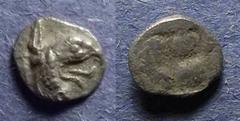 Ionia, Teos Circa 450 BC, Tetartemorion, .19g: Obv: Head of griffin right Rev: Incuse quadripart square. Rosen 603v.