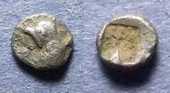 Ionia, Uncertain city Circa 500 BC, Tetartemorion, .20g, 5mm: Obv: Head of a bird left Rev: Incuse square. SNG Cop 373 (vol 7).